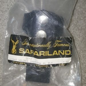 Safariland.leather light holder..